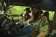 Mike and Daniel take off in a rock crawler in order to get to the drop of Old Coon Rod Mountain to meet the buyer of their latest patch of moonshine.