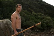 Phil Breslin im Abel Tasman National Park mit einer "Taiaha", einer traditionellen Maori Waffe.