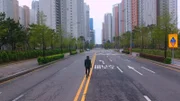 Derek Muller walking in Songdo, Korea