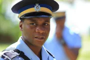 Officer J.P. Hooper (Tobi Bakare)