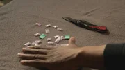 MIAMI, FLA.- Bags of molly laid out on the table.