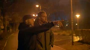 Mitglieder der Antifa-Bewegung in Südtirol beobachten eine rechtsnationale Gedenkzeremonie.
