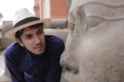 Picture Shows: Alastair looking at giant stone head ‚ì Cairo Museum Garden