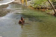 Steven Townes resting in the river.