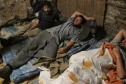 Erez Eltawil and fellow Israeli hostages try to sleep.