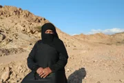 Khadnaa Eid Manzik, a Bedouin shepherdess.