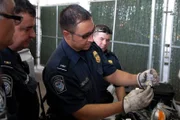 Laredo, TX: Customs and Border Protectionagents testing the smuggled substances found in a car to determine if they are cocaine.  (Photo Credit: © NGT)