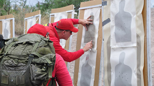 Nogales, Arizona, USA: Customs and border protection agent checks a practice target. Agents must train to prepare themselves for fights with drug smugglers and cartels.   (Photo credit: © NGTV)