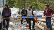 Bird, Matt, Rain, and Gabe Brown working on a deck.