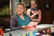 One of Dr. Lee's nurses reviewing a patient’s file.