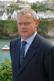 Dr. Martin Ellingham (Martin Clunes)