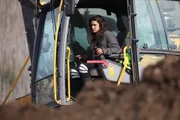 Emily Gorham in an excavator.