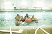 Group photo in the pool.