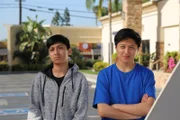 Jonathan and Christian stand outside Dr. Lee's office.