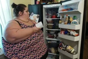 Alicia creating a grocery list.