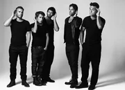 Robbie Williams (re.) sang bei der Boygroup Take That, bevor er als Solokünstler bekannt wurde.