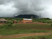 Clouds over a small house.