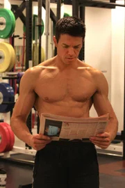 Picture Shows: Foreign exchange trader Charlie Burton keeps an eye on financial news while waiting for his body fat challenge photoshoot. He is pictured at Embody Fitness gym in London, where his fat levels were measured