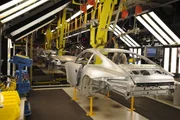 At the end of the body shop, 911 bodies pass through a light tunnel for quality inspection.