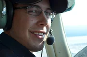 Pilot Travis.