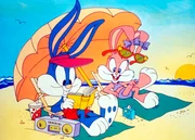Die kleinen Hasen Babsi und Buster genießen die Sonne am Strand.