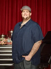 TATTOOS AFTER DARK -- Season 1 -- Pictured: BigT -- (Photo by: Tim Brown/Oxygen Media)