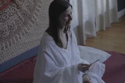 Recreation of Lama Christie holding knife
