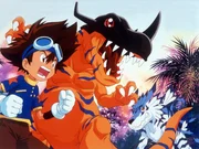 Zusammen sind sie stark: Taichi und Greymon.
