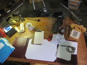 An aerial view of the police officer's desk.