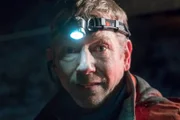 Odda, Norway - Tor Steinar Tveit (One of Thords employees) has the headlamp ready to work in the dark.