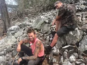 Keith and Willow sitting on rocks.