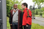 PSYCH -- "Lock, Stock, Some Smoking Barrells and Burton Guster's Goblet of Fire" Episode 801 -- Pictured: (l-r) Dule Hill as Burt Guster, James Roday as Shawn Spencer -- (Photo by: Alan Zenuk/USA Network)