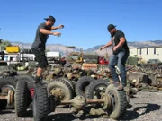 Heavy D and Muscle having a two-wheel competition.