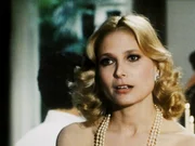 Casey Tcholok (Deborah Raffin).