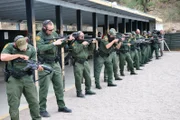 Nogales, Arizona, USA: Border Protection Agents practice firing their weapons in a training session.