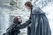 L-R: Alfie Allen as Theon Greyjoy and Sophie Turner as Sansa Stark