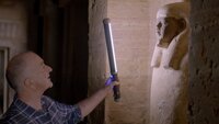 Picture shows_Presenter Tony Robinson peers into the eyes of a Statue of the great ruler Sarenput II. This is the grandest tomb in the city of the dead in Aswan. Sarenput II was an Egyptian king or nomarch 4000 years ago Picture shows_Presenter Tony Robinson peers into the eyes of a Statue of the great ruler Sarenput II. This is the grandest tomb in the city of the dead in Aswan. Sarenput II was an Egyptian king or nomarch 4000 years ago