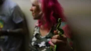 Durban, South Africa - Siouxsie Gillett holds a natal green snake (Philothamnus natalensis) (Earth Touch LTD/Daniel Philogene)