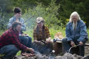 The Browns have a campfire cookout.