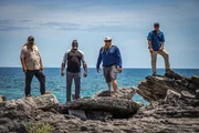 L-R: Moe Mottice, Mike Still, Chuck Meier and Dave Cziko walking up a reef.