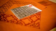 Kalligrafie mit Kufi-Schrift des Krönungsmantels.