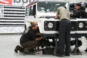 Kipp and Joel work to remove the steering column.