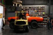 Heavy D in forklift raising El Camino