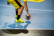 Handball player and a ball