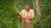 Michael gathering fronds.