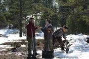 L-R: Gabriel Brown, Rain Brown, Amora "Bird" Jean clearing snow from their land.