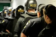 Sacramento, California: Deputies preparing for a shakedwn in a pod.