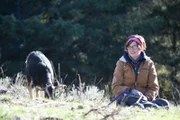 Rain Brown outside her home with some ranch residents.