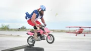 Diesel Dave pink bike jump stunt.