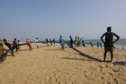 Fischer am Strand.